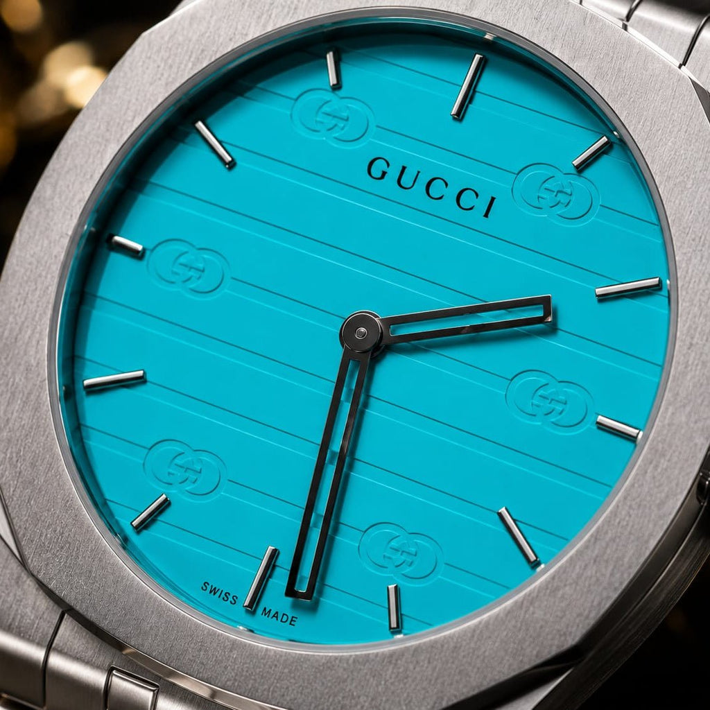 Gucci Men's | Silver Stainless Steel | Turquoise GG Dial - VogueHourGucci Men's | Silver Stainless Steel | Turquoise GG Dial