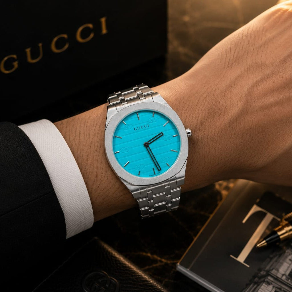 Gucci Men's | Silver Stainless Steel | Turquoise GG Dial - VogueHourGucci Men's | Silver Stainless Steel | Turquoise GG Dial